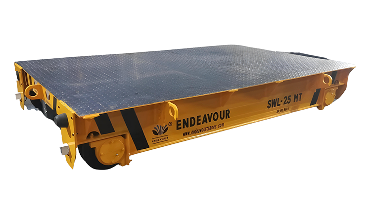 A heavy-duty industrial transfer trolley used for moving materials in a manufacturing facility.